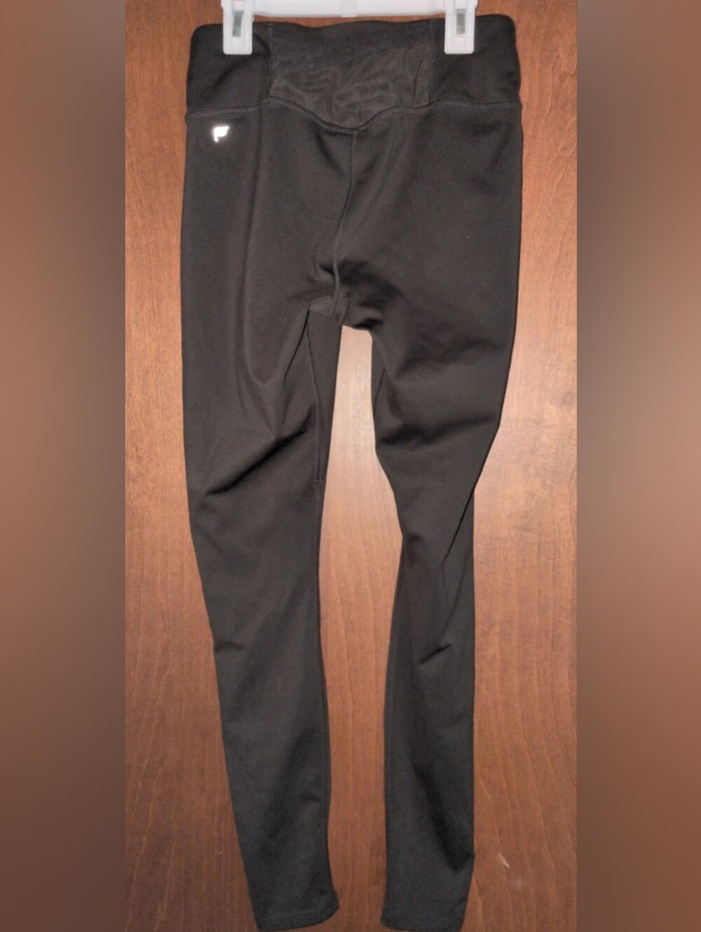 Fabletics Dark Green Performance Leggings with Subtle Reflective Logo